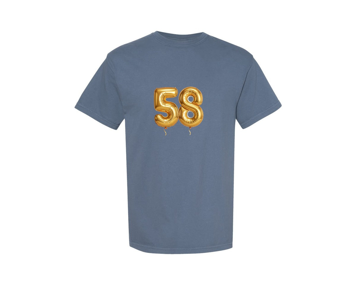 brand:Comfort Colors|color:Blue Jean|51 100 Gold Numbers Balloon Graphic T-Shirt
