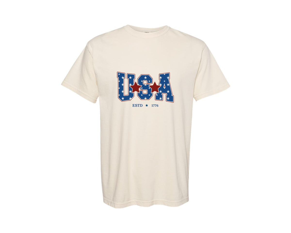 brand:Comfort Colors|color:Ivory|4Th Of July Usa Patriotic Varsity Graphic T-Shirt