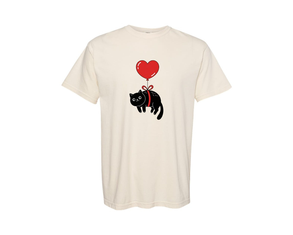 brand:Comfort Colors|color:Ivory|Floating Black Cat With Heart Balloon Graphic T-Shirt