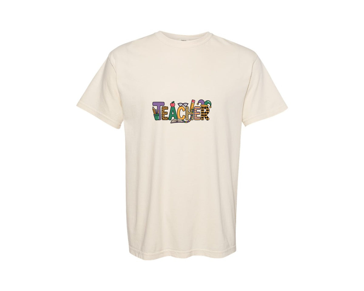 brand:Comfort Colors|color:Ivory|Mardi Gras Teacher Design Graphic T-Shirt