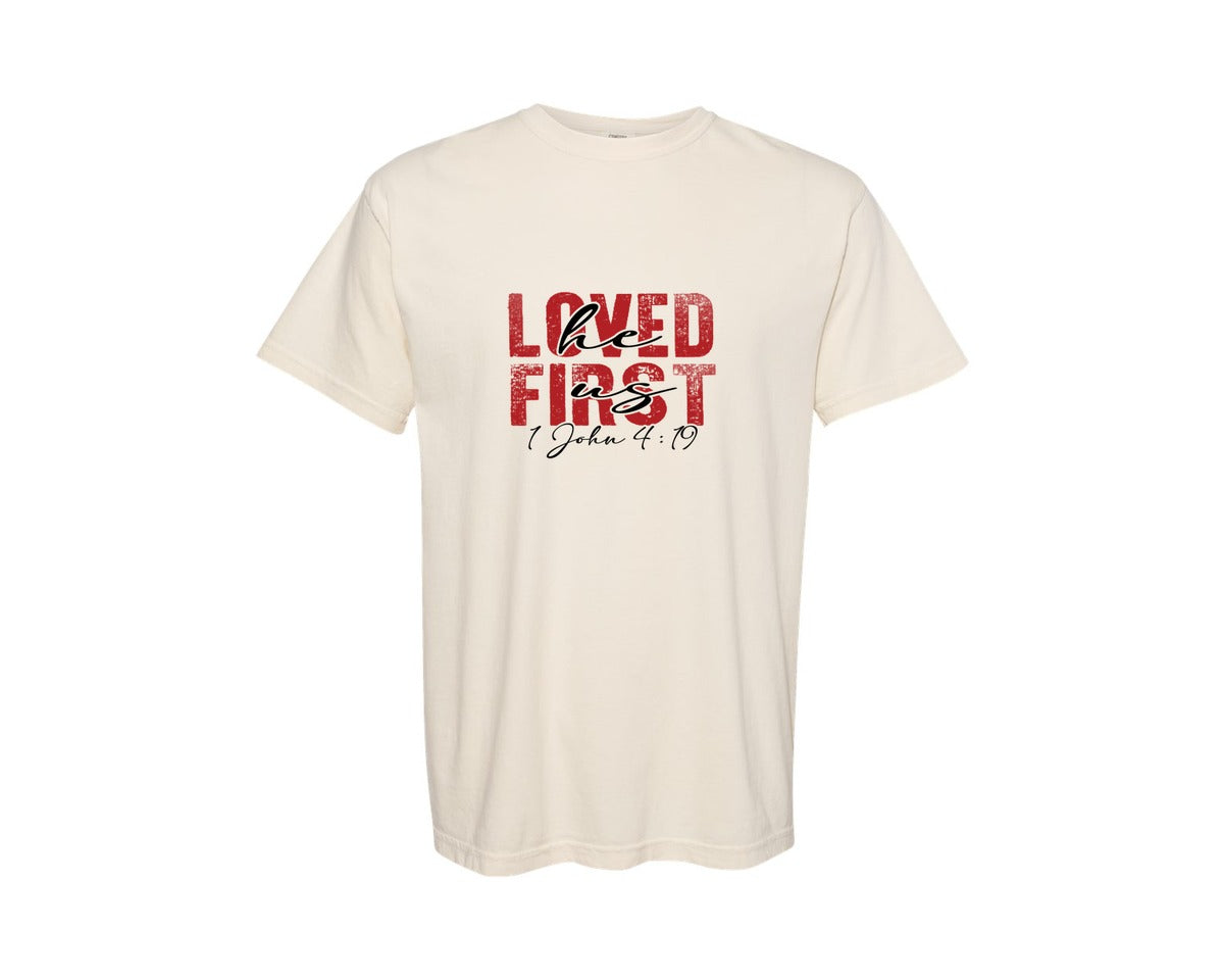 brand:Comfort Colors|color:Ivory|He Loved Us First Valentine Jesus 2 Graphic T-Shirt