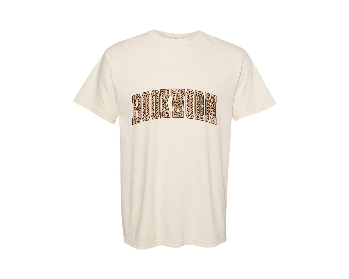 brand:Comfort Colors|color:Ivory|Leopard Bookworm Varsity Bookish Book Graphic T-Shirt