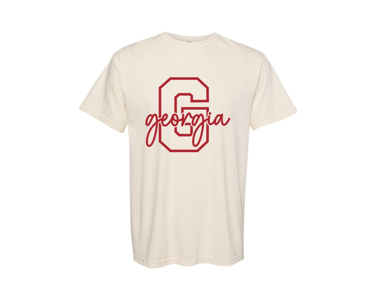 brand:Comfort Colors|color:Ivory|Georgia Initial Football Graphic T-Shirt