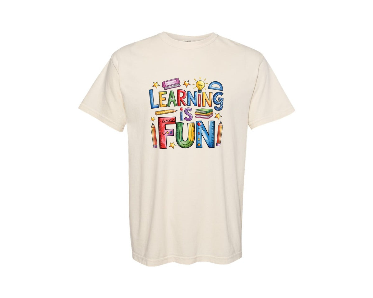 brand:Comfort Colors|color:Ivory|Learning Is Fun School Kindergarten Graphic T-Shirt