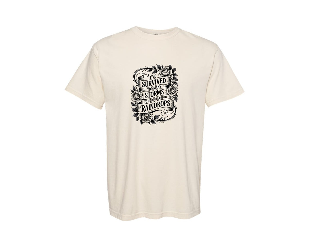 brand:Comfort Colors|color:Ivory|Ive Survived Too Many Storms Tshirt Graphic T-Shirt