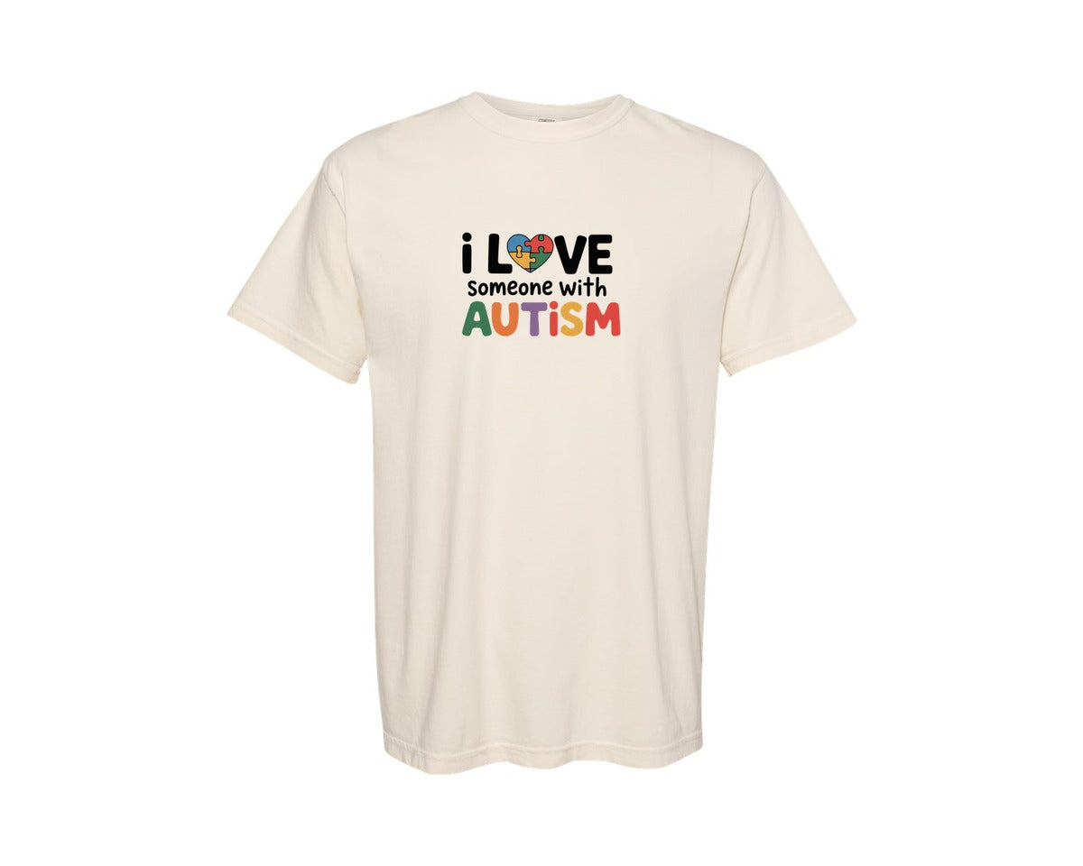 brand:Comfort Colors|color:Ivory|I Love Someone With Autism 10 Graphic T-Shirt