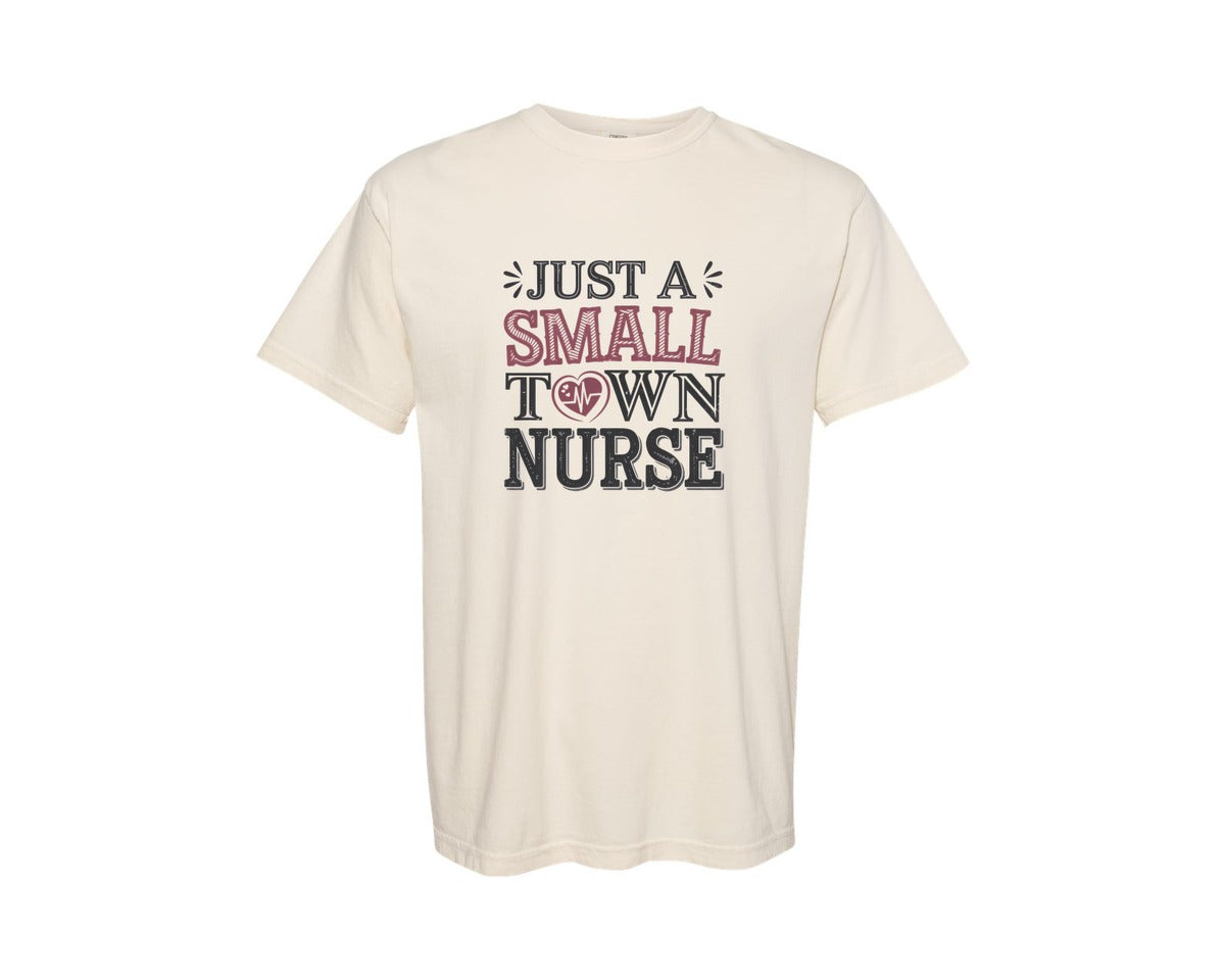 brand:Comfort Colors|color:Ivory|Just A Small Town Nurse Graphic T-Shirt