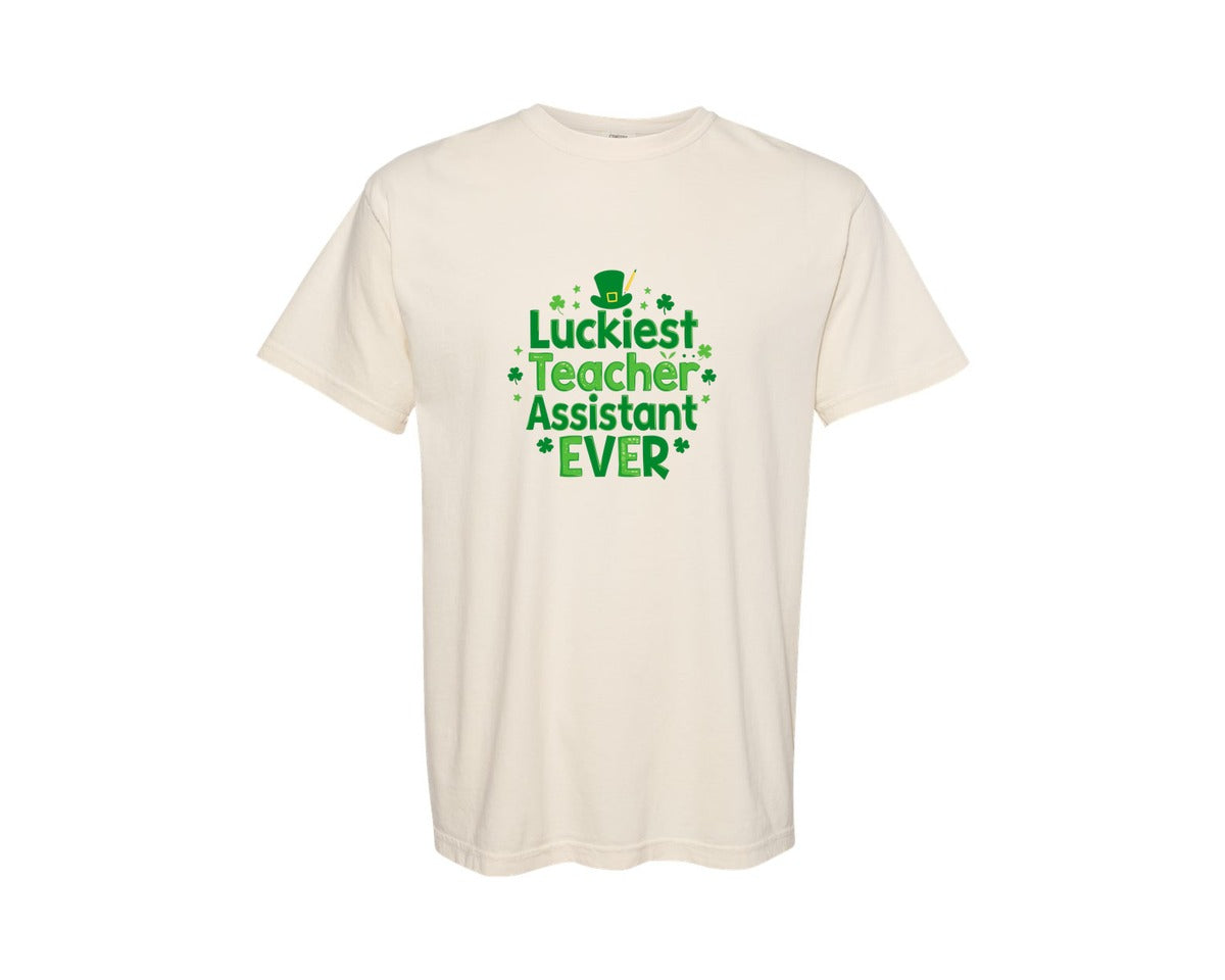 brand:Comfort Colors|color:Ivory|Luckiest Teacher Assistant Ever Graphic T-Shirt
