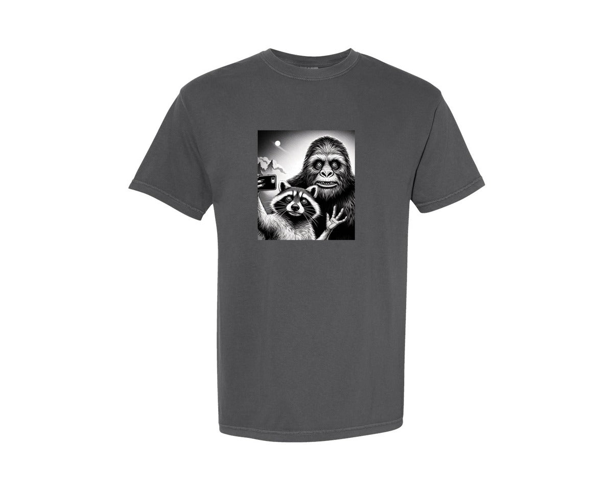 brand:Comfort Colors|color:Pepper|Scarred Raccoon Selfie With Bigfoot Yeti Graphic T-Shirt