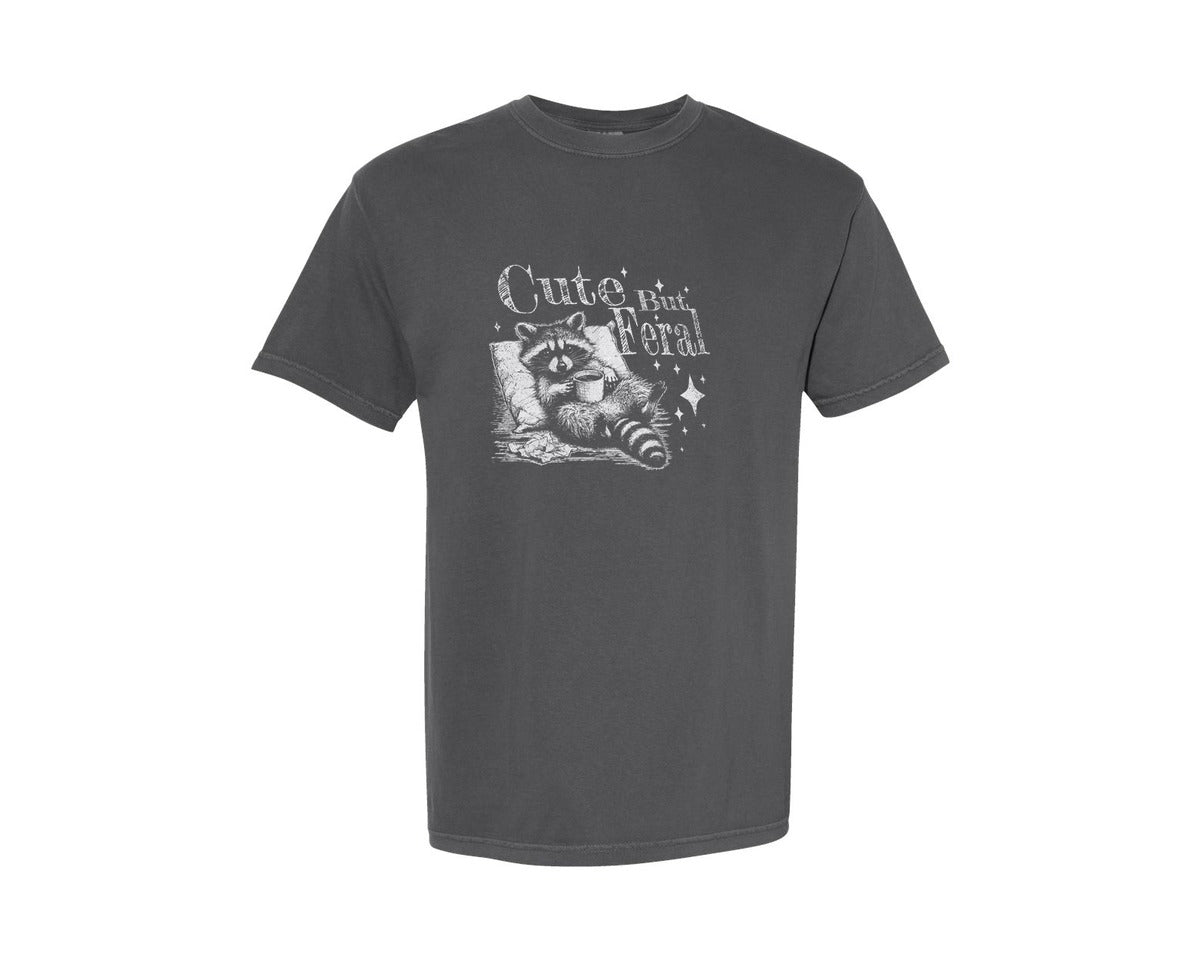 brand:Comfort Colors|color:Pepper|Cute But Feral Raccoon With Coffee Shirt Graphic T-Shirt