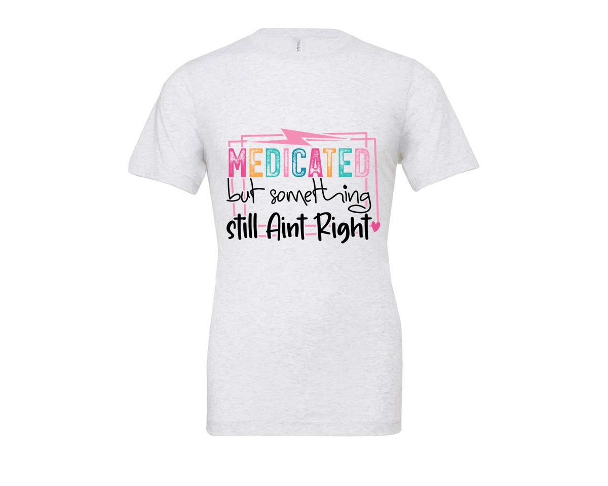 brand:Bella Canvas|color:Ash Grey|Medicated But Somethin Aint Right Snarky Graphic T-Shirt