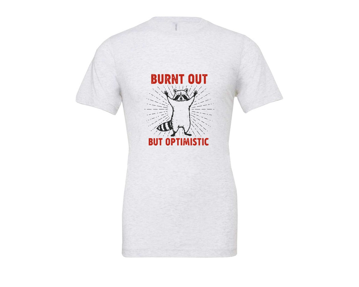brand:Bella Canvas|color:Ash Grey|Burnt Out But Optimistic Raccoon Graphic T-Shirt