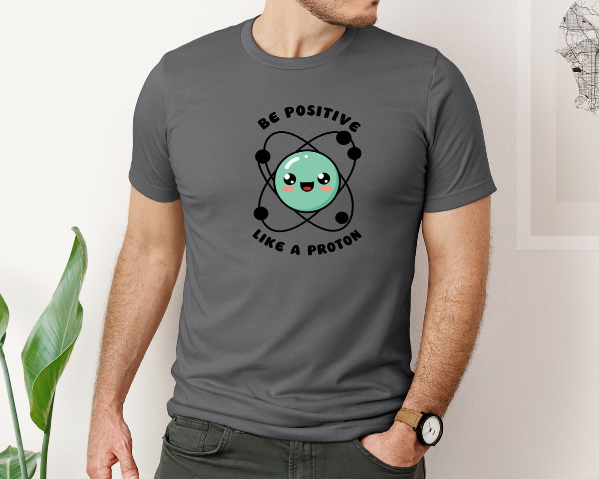 brand:Bella Canvas|color:Asphalt|Be Positive Like A Proton Graphic T-Shirt