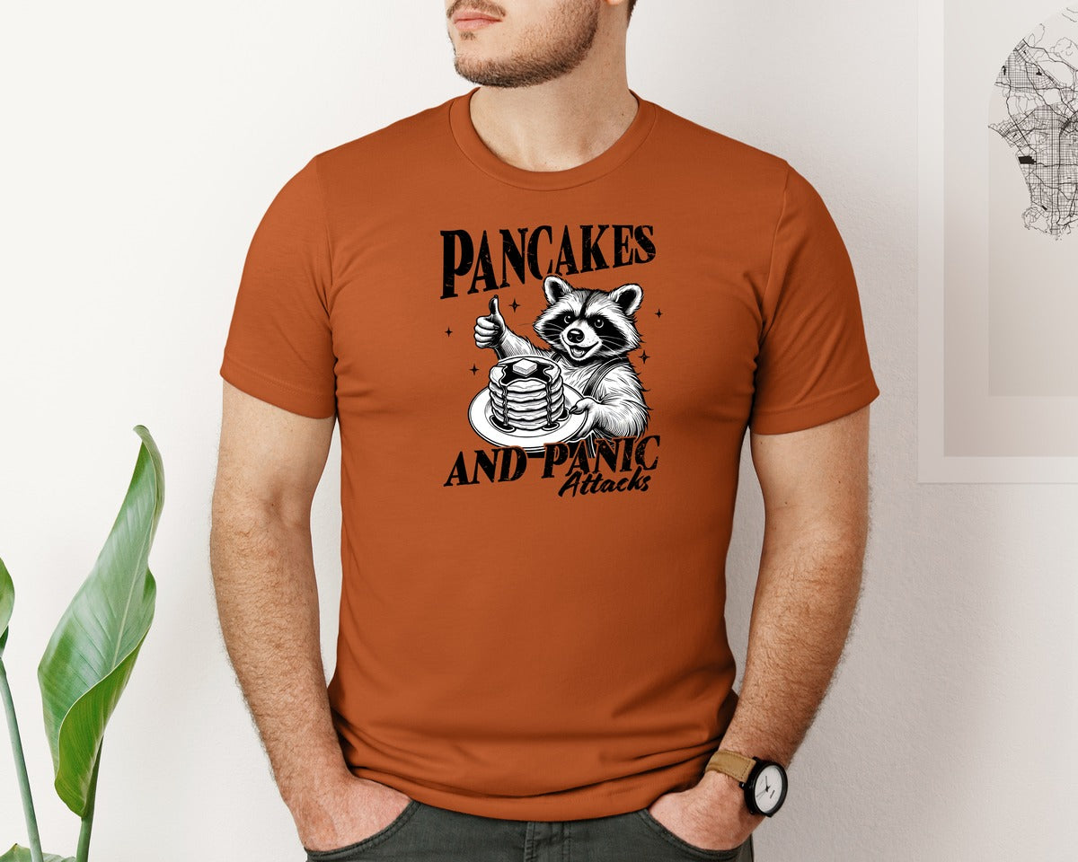 brand:Bella Canvas|color:Autumn|Mental Health Raccoon Pancakes And Panic Graphic T-Shirt