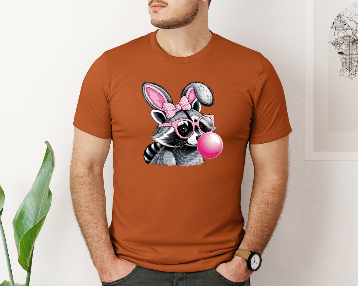 brand:Bella Canvas|color:Autumn|Cute Raccoon With Glasses Bubble Gum 6 Graphic T-Shirt