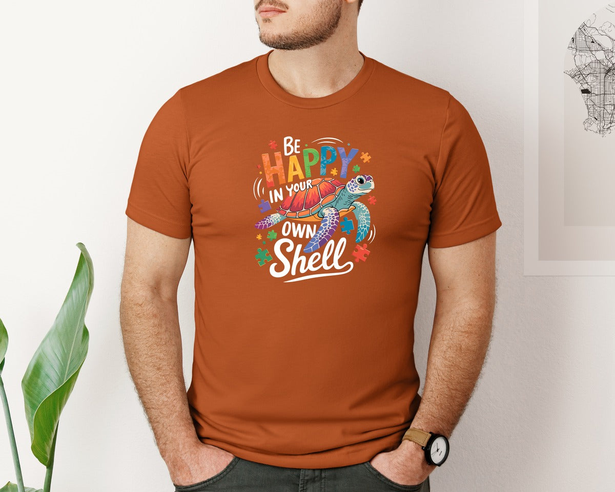 brand:Bella Canvas|color:Autumn|Be Happy In Your Own Shell Autism Avg Graphic T-Shirt