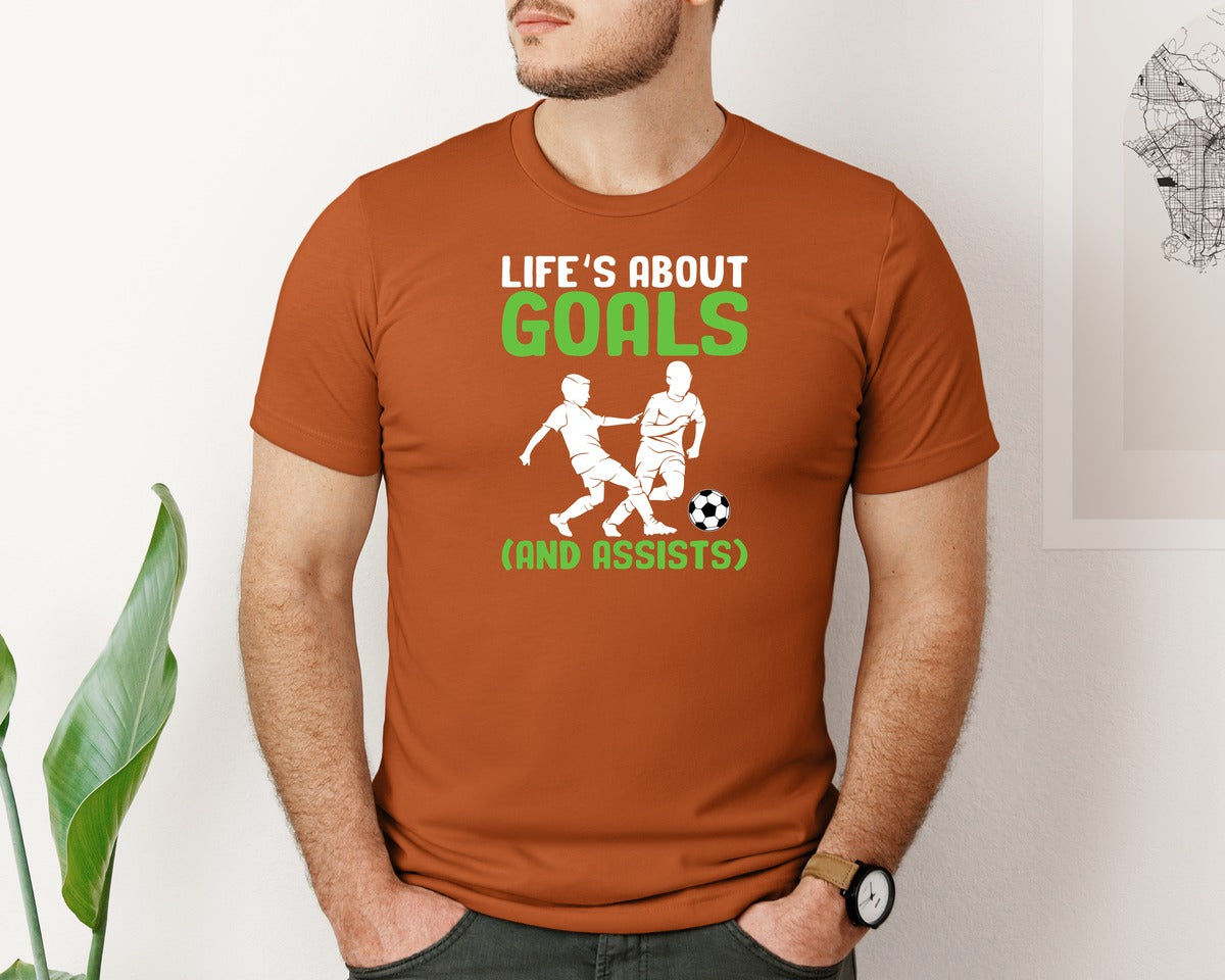 brand:Bella Canvas|color:Autumn|Lifes About Goals Soccer T Shirt Graphic T-Shirt
