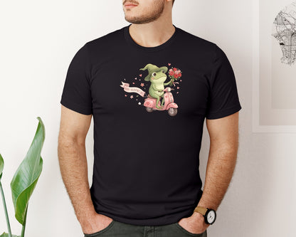 brand:Bella Canvas|color:Black|Cute Valentine Frog Riding Scooter Graphic T-Shirt