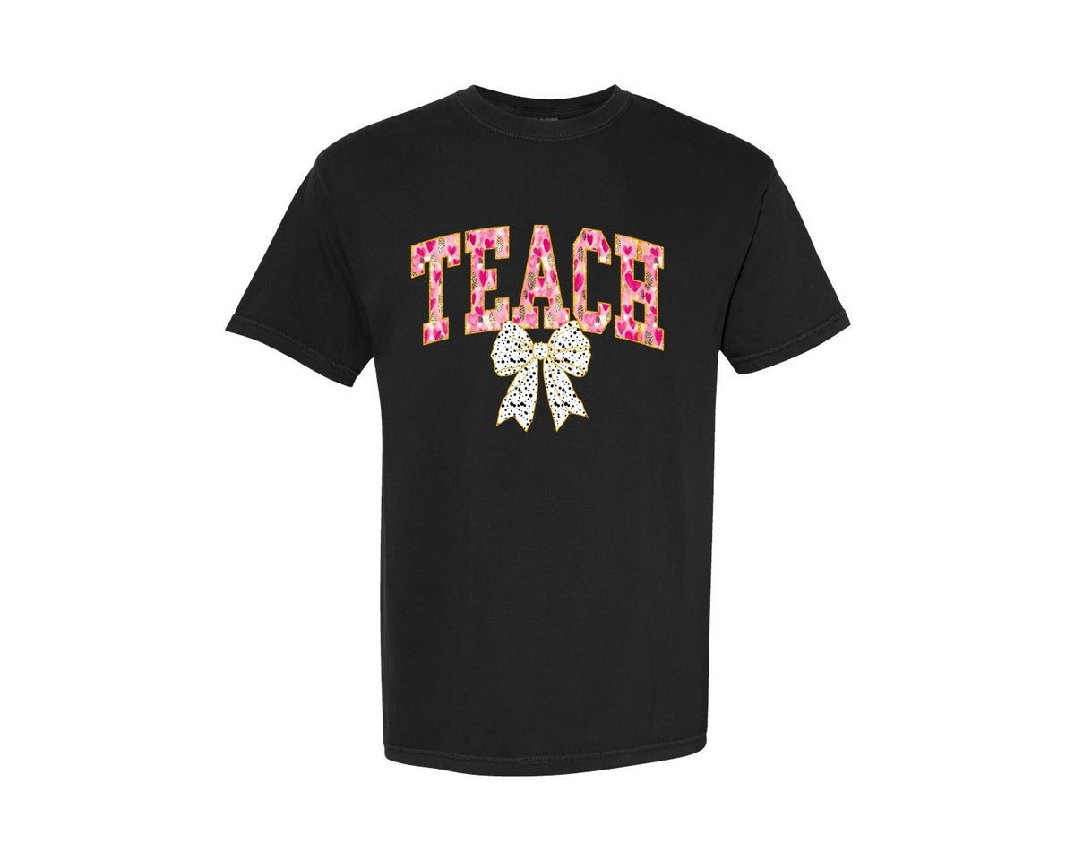 brand:Comfort Colors|color:Black|Teacher Valentine Teach Coquette Bow Graphic T-Shirt