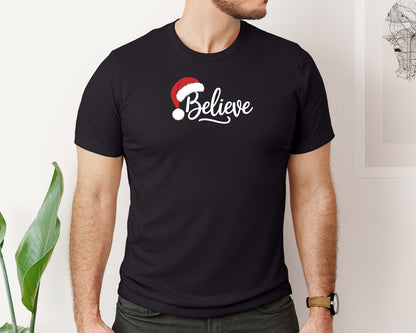 brand:Bella Canvas|color:Black|Christmas Santa Hat Holiday Believe Graphic T-Shirt