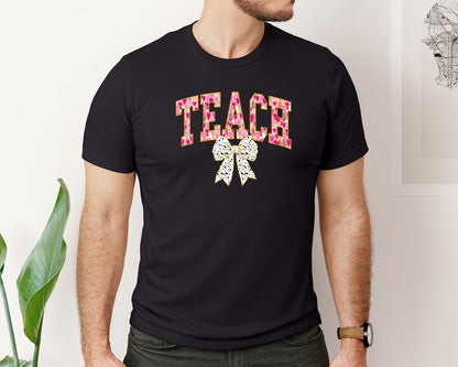 brand:Bella Canvas|color:Black|Teacher Valentine Teach Coquette Bow Graphic T-Shirt