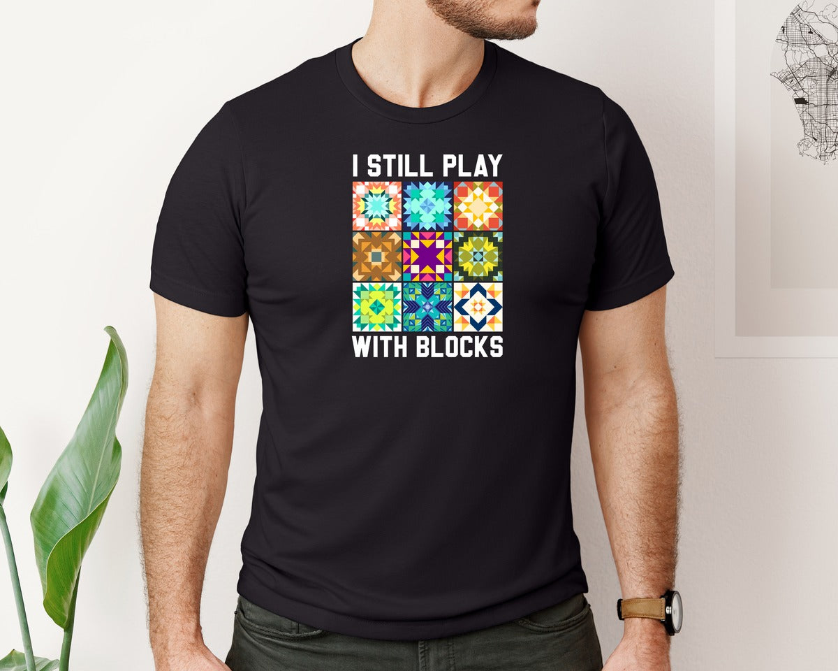 brand:Bella Canvas|color:Black|I Still Play With Blocks Pngquilt Block Graphic T-Shirt