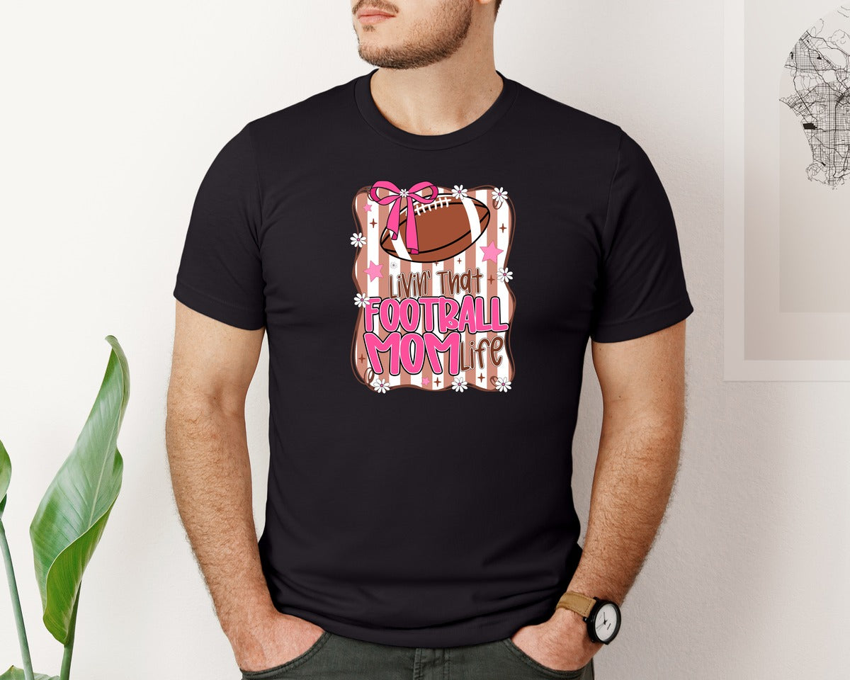 brand:Bella Canvas|color:Black|Livin That Football Mom Pink Bow Graphic T-Shirt