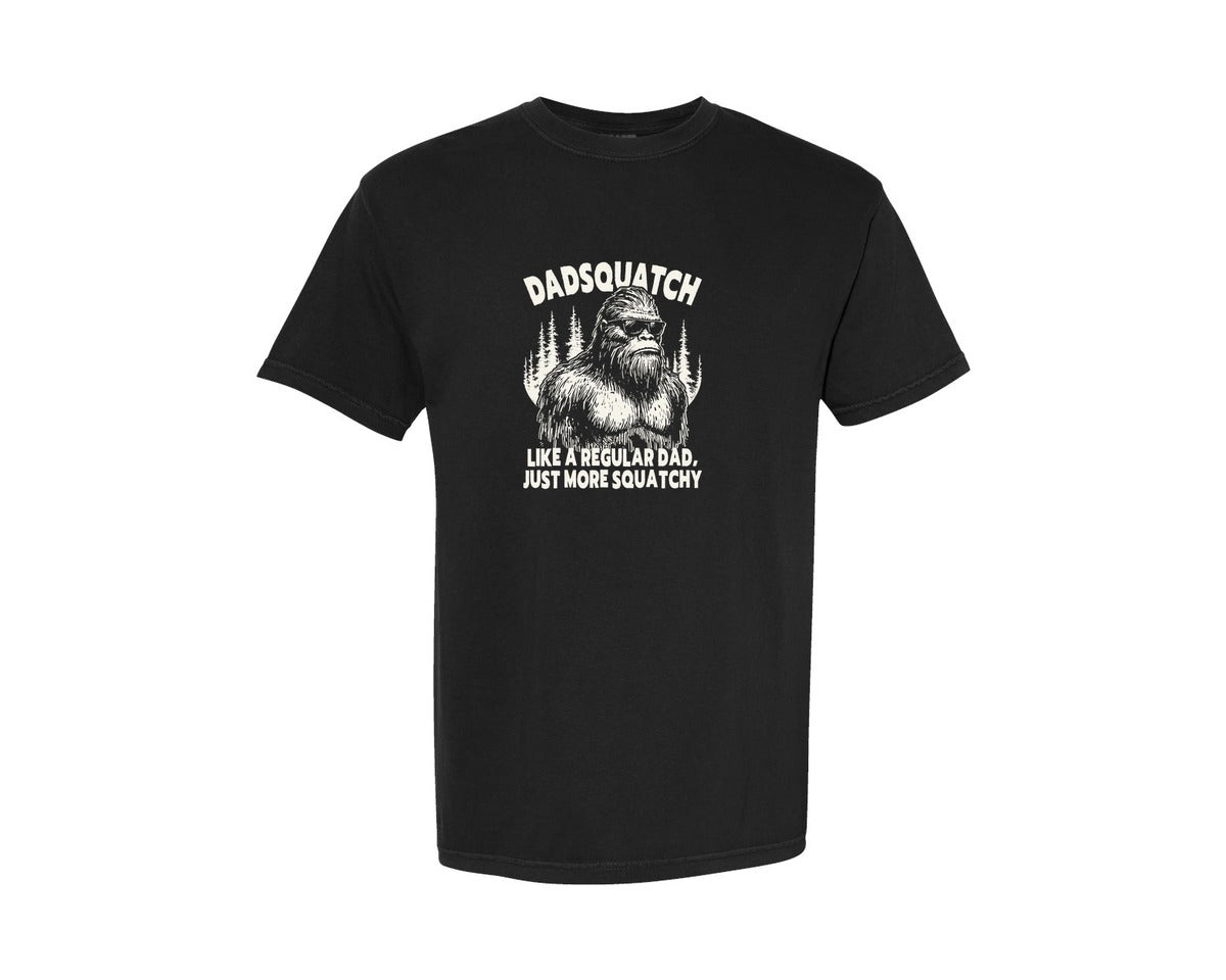 brand:Comfort Colors|color:Black|Dadsquatch Bigfoot Wearing Sunglasses Graphic T-Shirt