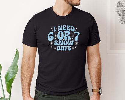 brand:Bella Canvas|color:Black|I Need 6 Or 7 Snow Days Teacher Graphic T-Shirt