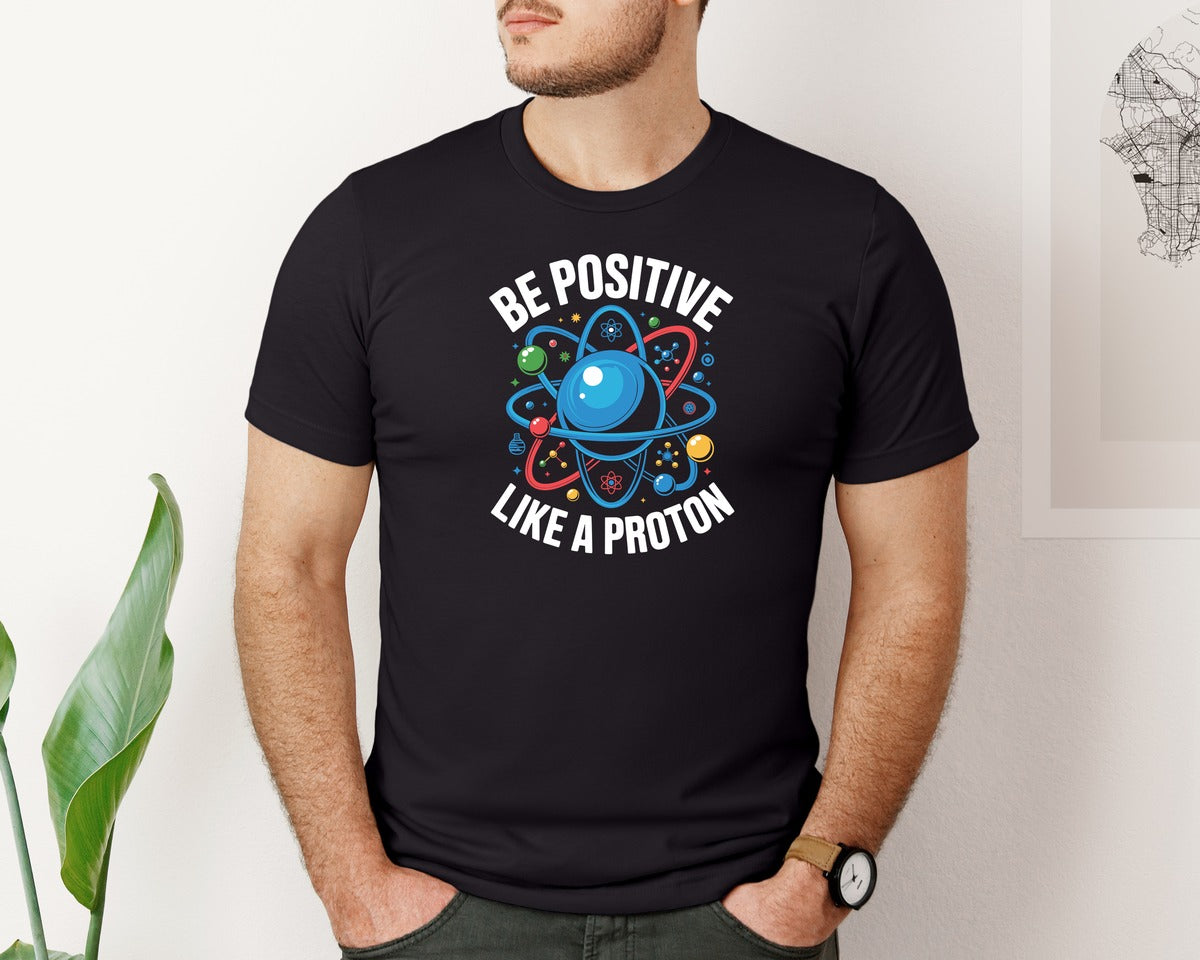 brand:Bella Canvas|color:Black|Be Positive Like A Proton T Shirt Design Graphic T-Shirt