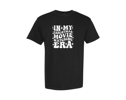 brand:Comfort Colors|color:Black|In My Christmas Movie Watching Era Retro Graphic T-Shirt