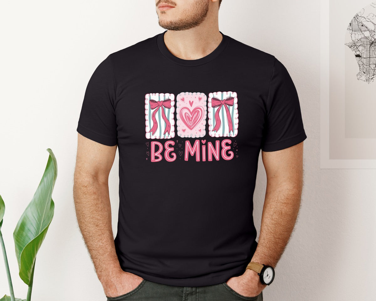 brand:Bella Canvas|color:Black|Be Mine Valentines Day Lov Bow Graphic T-Shirt