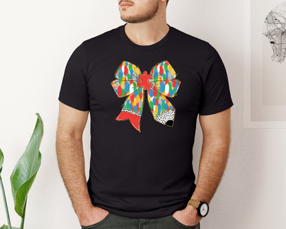 brand:Bella Canvas|color:Black|Brushstroke Autism Pencil Bow Graphic T-Shirt