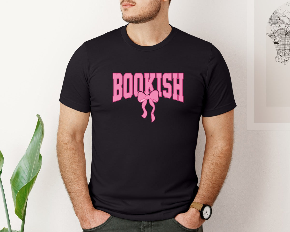 brand:Bella Canvas|color:Black|Preppy Book Pink Bow Coquette Bookish Graphic T-Shirt