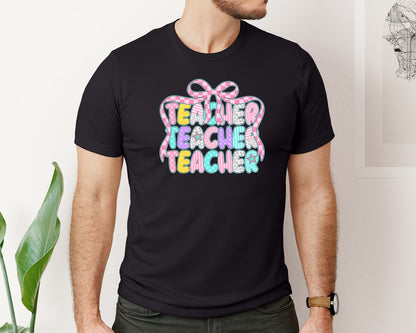 brand:Bella Canvas|color:Black|Preppy Teacher Coquette Bow Back To Graphic T-Shirt