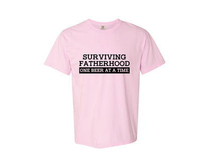 brand:Comfort Colors|color:Blossom|Surviving Fatherhood Mens T Shirt Graphic T-Shirt