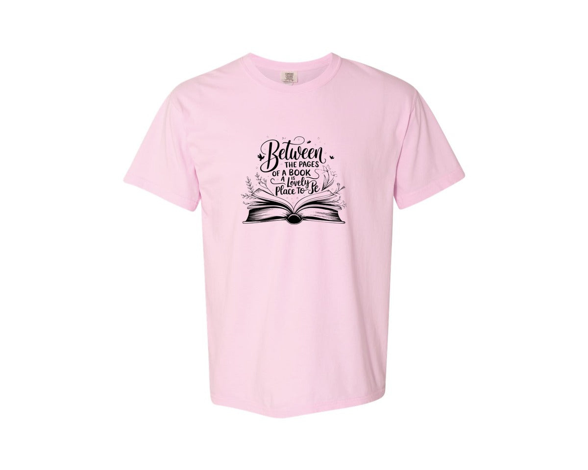 brand:Comfort Colors|color:Blossom|Between The Pages Of A Book Is A Lovely 24 Graphic T-Shirt