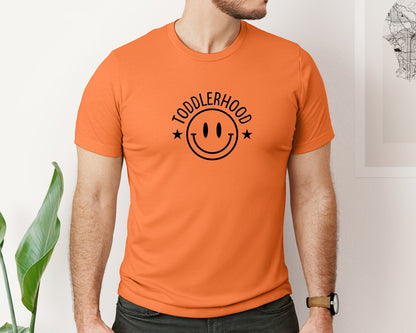 brand:Bella Canvas|color:Burnt Orange|Toddlerhood Graphic T-Shirt