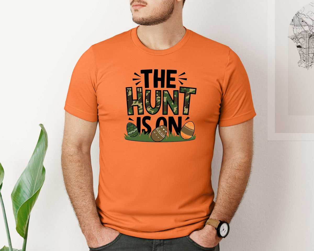 brand:Bella Canvas|color:Burnt Orange|The Hunt Is On Camo Easter Egg Camo Graphic T-Shirt