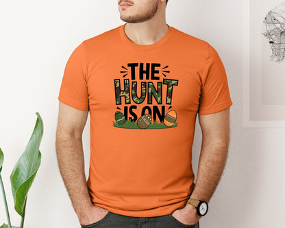brand:Bella Canvas|color:Burnt Orange|The Hunt Is On Camo Easter Egg Camo Graphic T-Shirt
