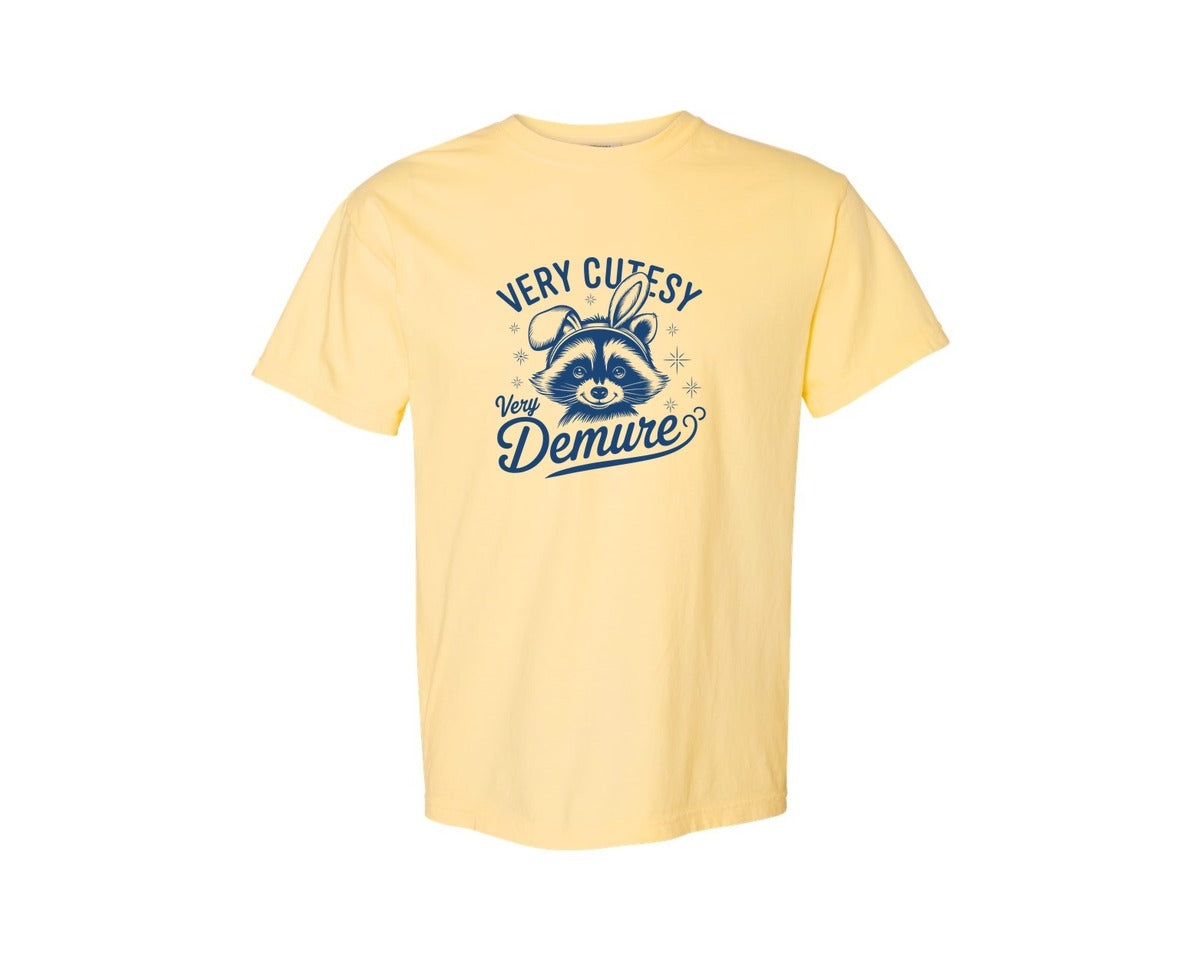 brand:Comfort Colors|color:Butter|Very Cutesy Very Demure Raccoon T Shirt Graphic T-Shirt