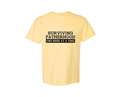 brand:Comfort Colors|color:Butter|Surviving Fatherhood Mens T Shirt Graphic T-Shirt