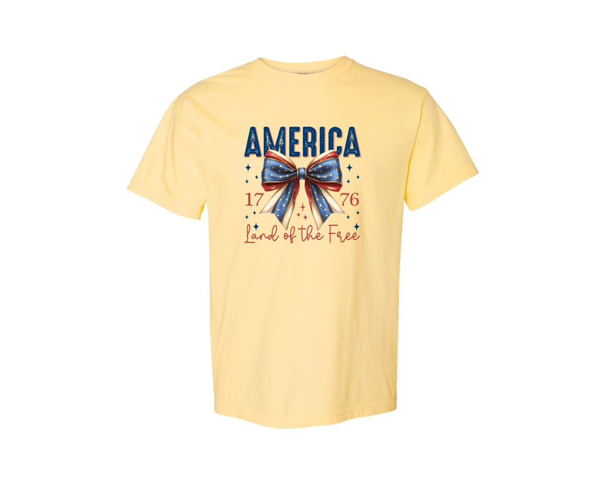 brand:Comfort Colors|color:Butter|America Bow Land Of The Free Graphic T-Shirt
