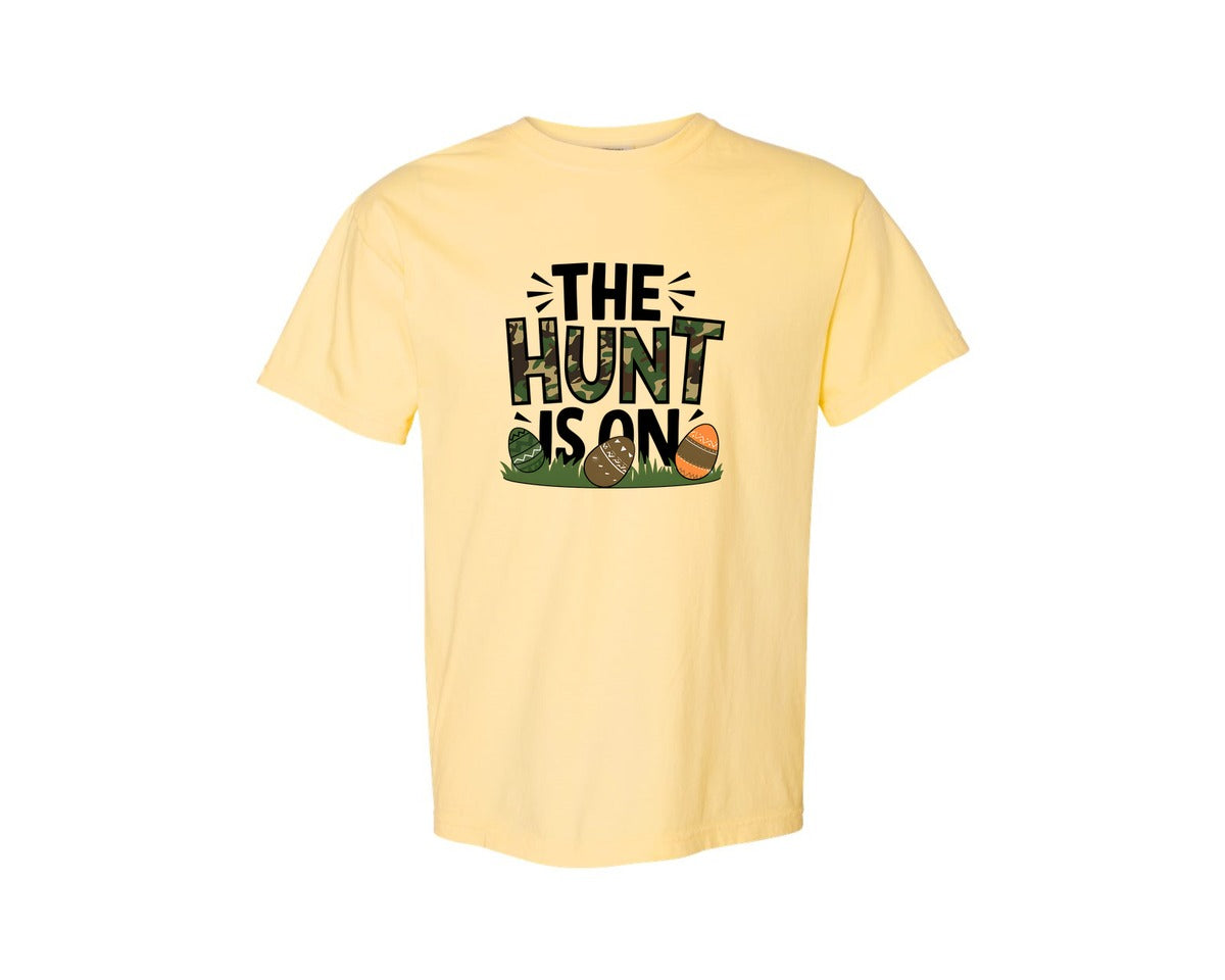 brand:Comfort Colors|color:Butter|The Hunt Is On Camo Easter Egg Camo Graphic T-Shirt