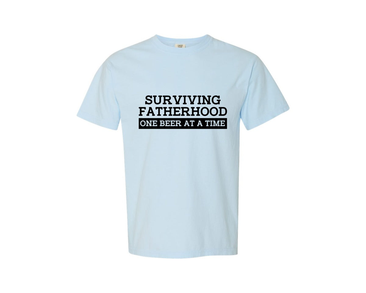 brand:Comfort Colors|color:Chambray|Surviving Fatherhood Mens T Shirt Graphic T-Shirt