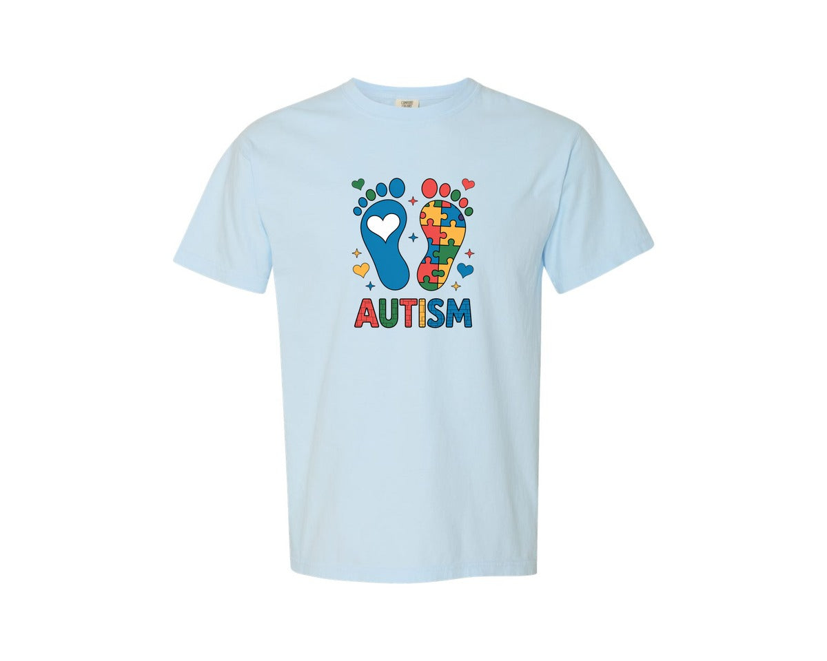 brand:Comfort Colors|color:Chambray|Autism Footprints Puzzle Foot Graphic T-Shirt