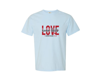 brand:Comfort Colors|color:Chambray|Love Never Fails Faith Valentin Graphic T-Shirt