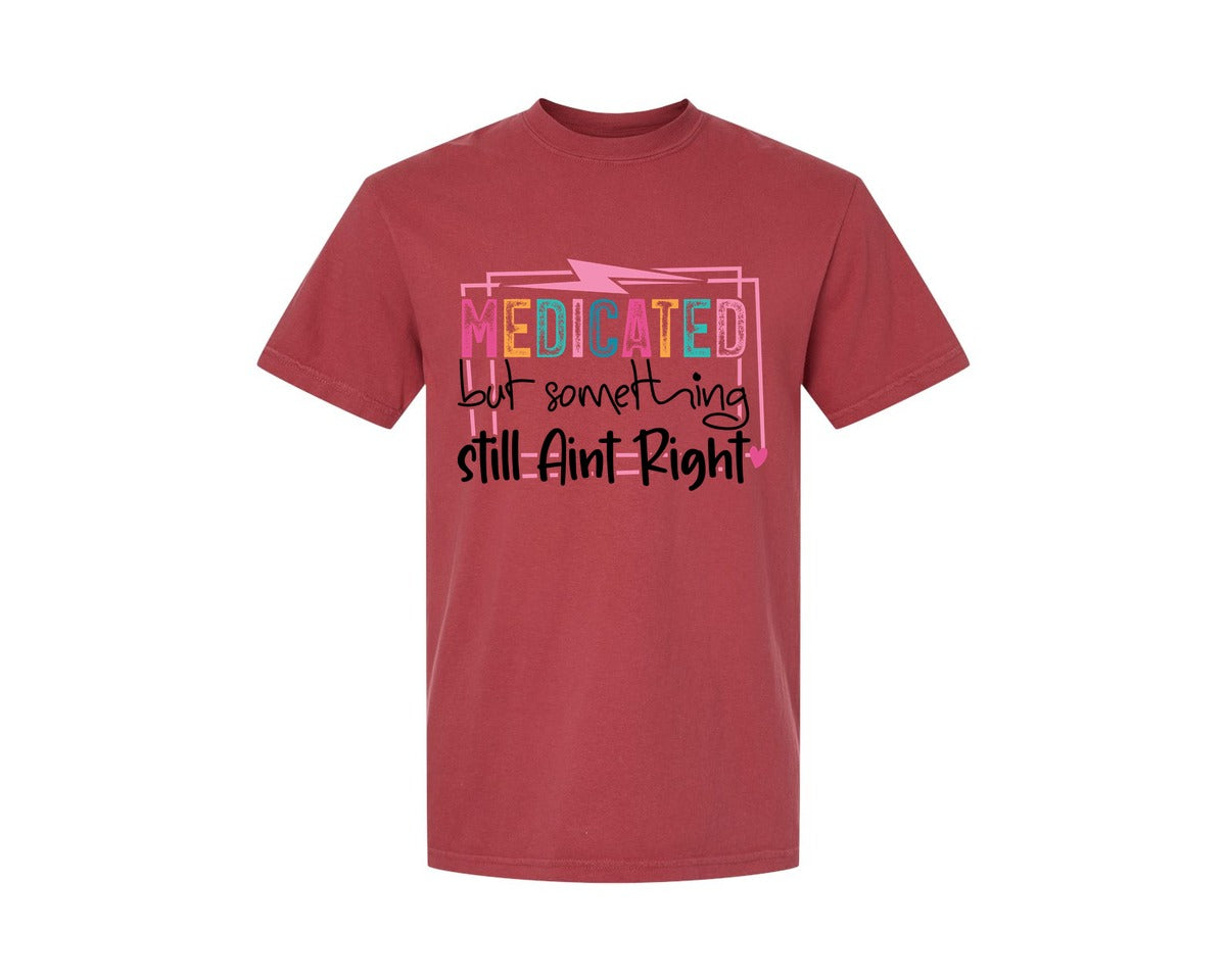 brand:Comfort Colors|color:Chili|Medicated But Somethin Aint Right Snarky Graphic T-Shirt