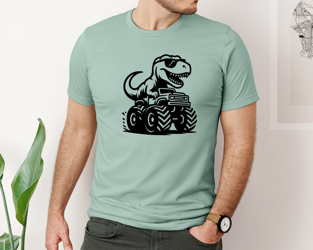 brand:Bella Canvas|color:Dusty Blue|T Rex Riding Monster Truck Graphic T-Shirt
