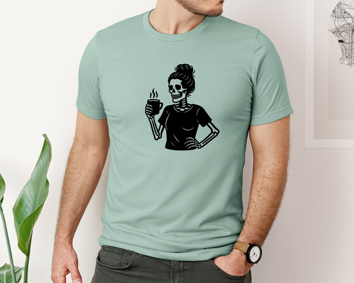 brand:Bella Canvas|color:Dusty Blue|Skeleton Woman Messy Bun Drinking Coffee Graphic T-Shirt